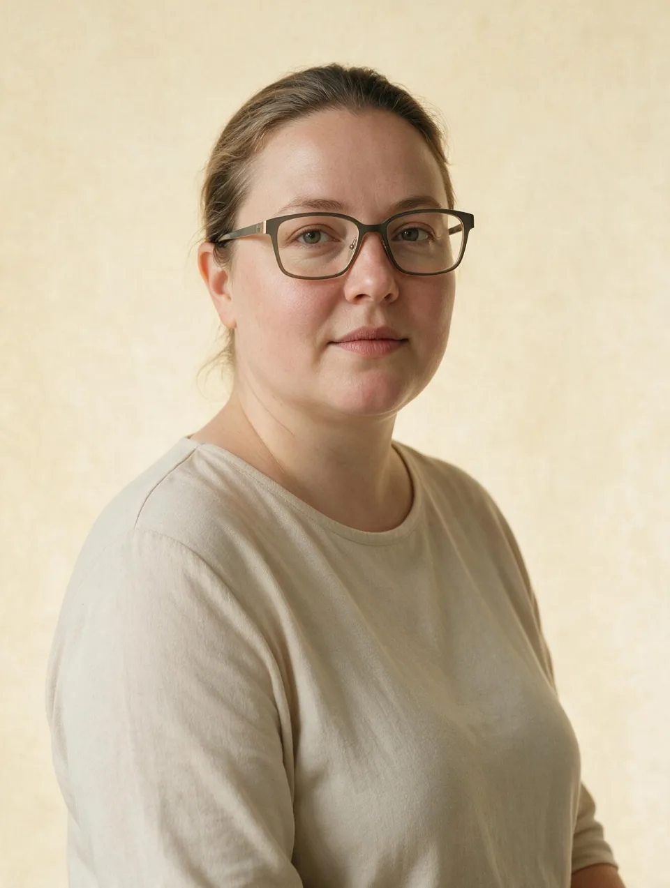 AI model with a round face wearing angular rectangular eyeglass frames